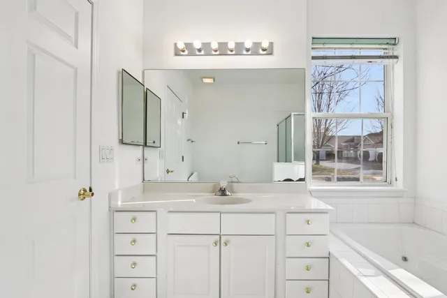 a view of walk in closet with window