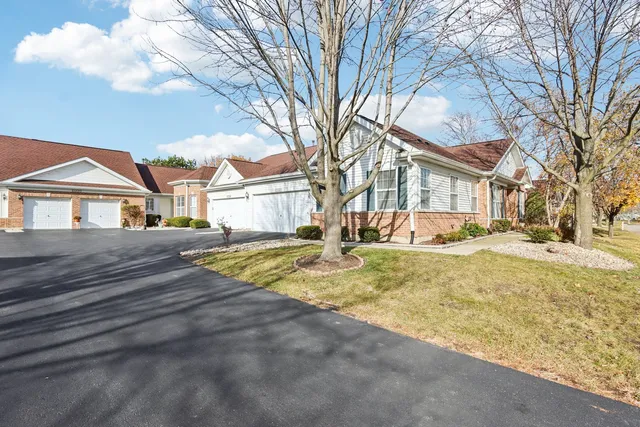 a view of a yard in front of a building