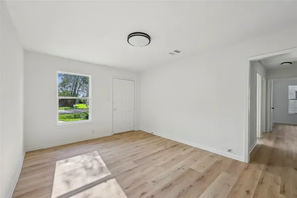 an empty room with windows