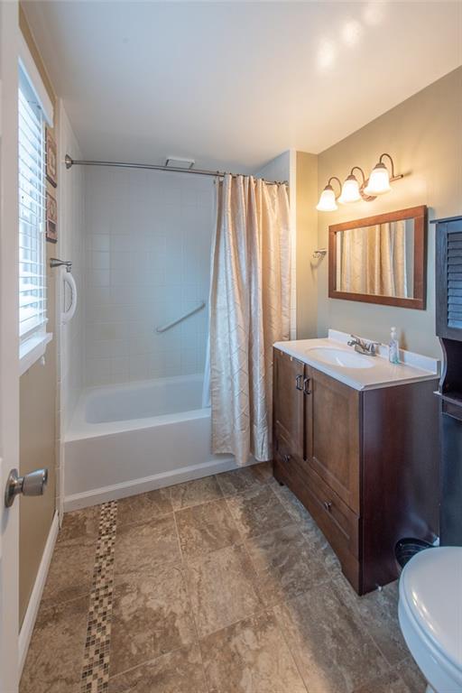 211 Rush Valley Road Monroeville, PA 15146 - Photo 17 of 25 Newer light and vanity, updated Master Bath with Tub/Shower combo.