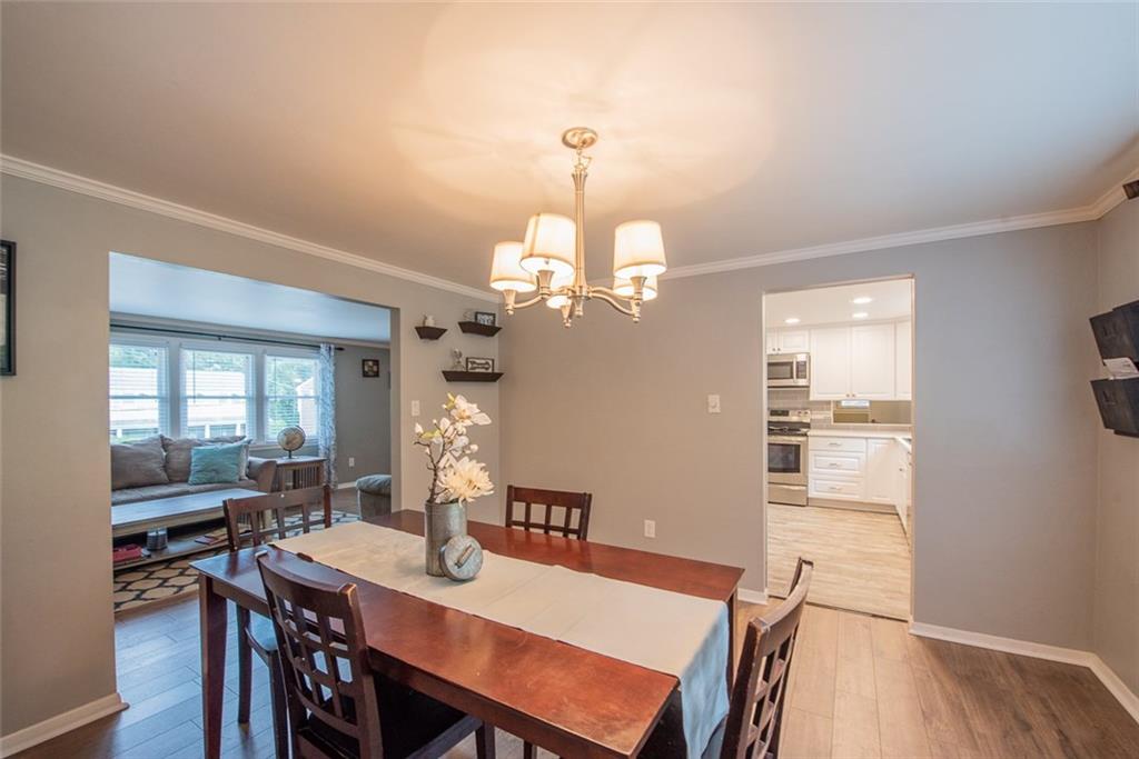 211 Rush Valley Road Monroeville, PA 15146 - Photo 9 of 25 Dining Room open to the Kitchen and Living Room