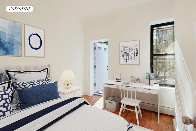 a view of a room that has a table and chair