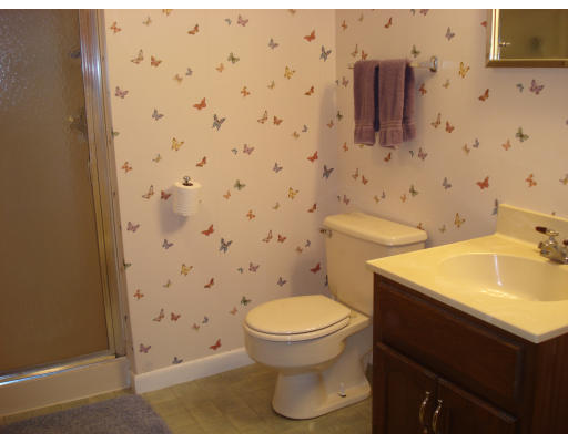 72 Corey Road Springfield, MA 01128 - Photo 24 of 26 a bathroom with a sink toilet and shower