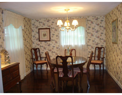 72 Corey Road Springfield, MA 01128 - Photo 6 of 26 a view of a dining room with furniture and chandelier
