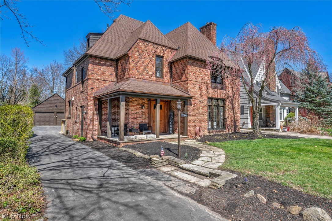 17409 Fernway Road Cleveland, OH 44120 - Photo 2 of 47 View of front of house with a front yard and a garage