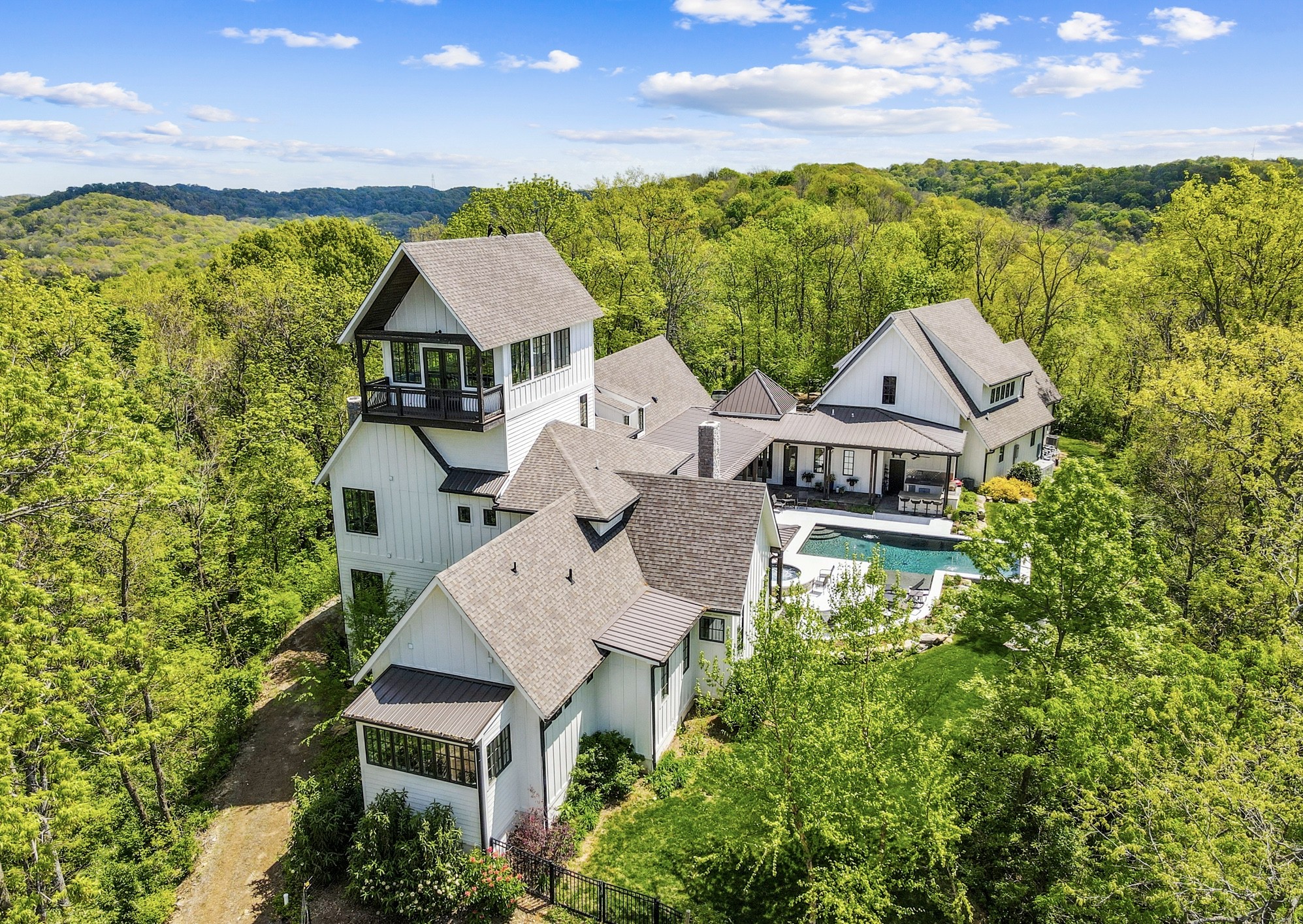 an aerial view of a house with a garden