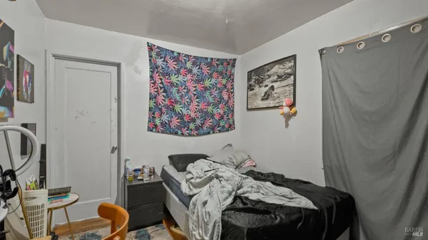 a bedroom with a bed and furniture