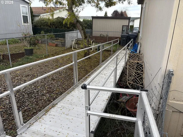 a view of balcony with wooden floor