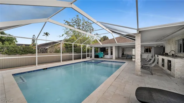 a view of a living room and kitchen floor