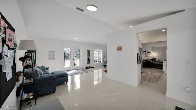 a living room with furniture and a view of living room