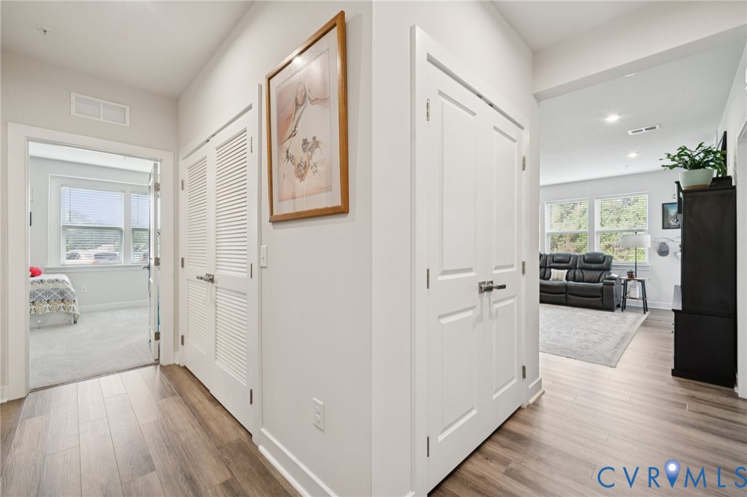 4000 Maze Runner Drive, Unit 103 Midlothian, VA 23112 - Photo 14 of 24 a view of a livingroom with wooden floor