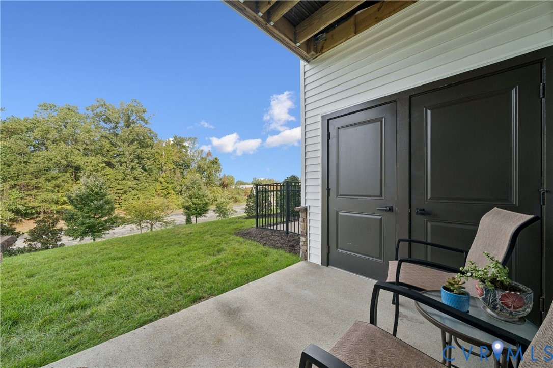 4000 Maze Runner Drive, Unit 103 Midlothian, VA 23112 - Photo 19 of 24 a view of backyard of a house