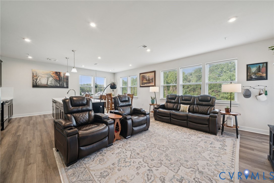 4000 Maze Runner Drive, Unit 103 Midlothian, VA 23112 - Photo 2 of 24 a living room with furniture and a large window