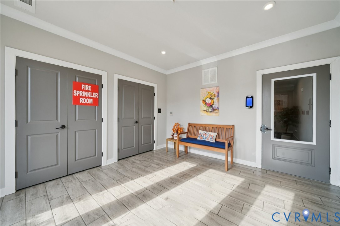 4000 Maze Runner Drive, Unit 103 Midlothian, VA 23112 - Photo 20 of 24 a bedroom with furniture and window