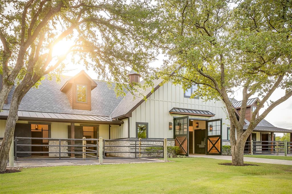 5000 T W King Road Southlake, TX 76092 - Photo 3 of 40 Architectural details in the barn rival those of a fine home — from lighting to layout.