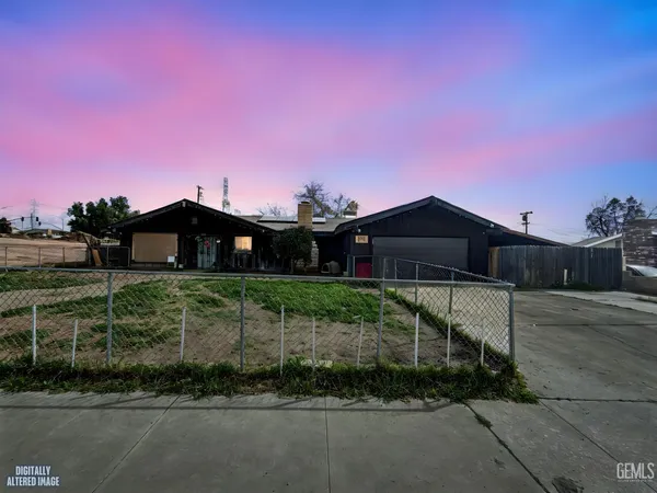 a view of a house with a street