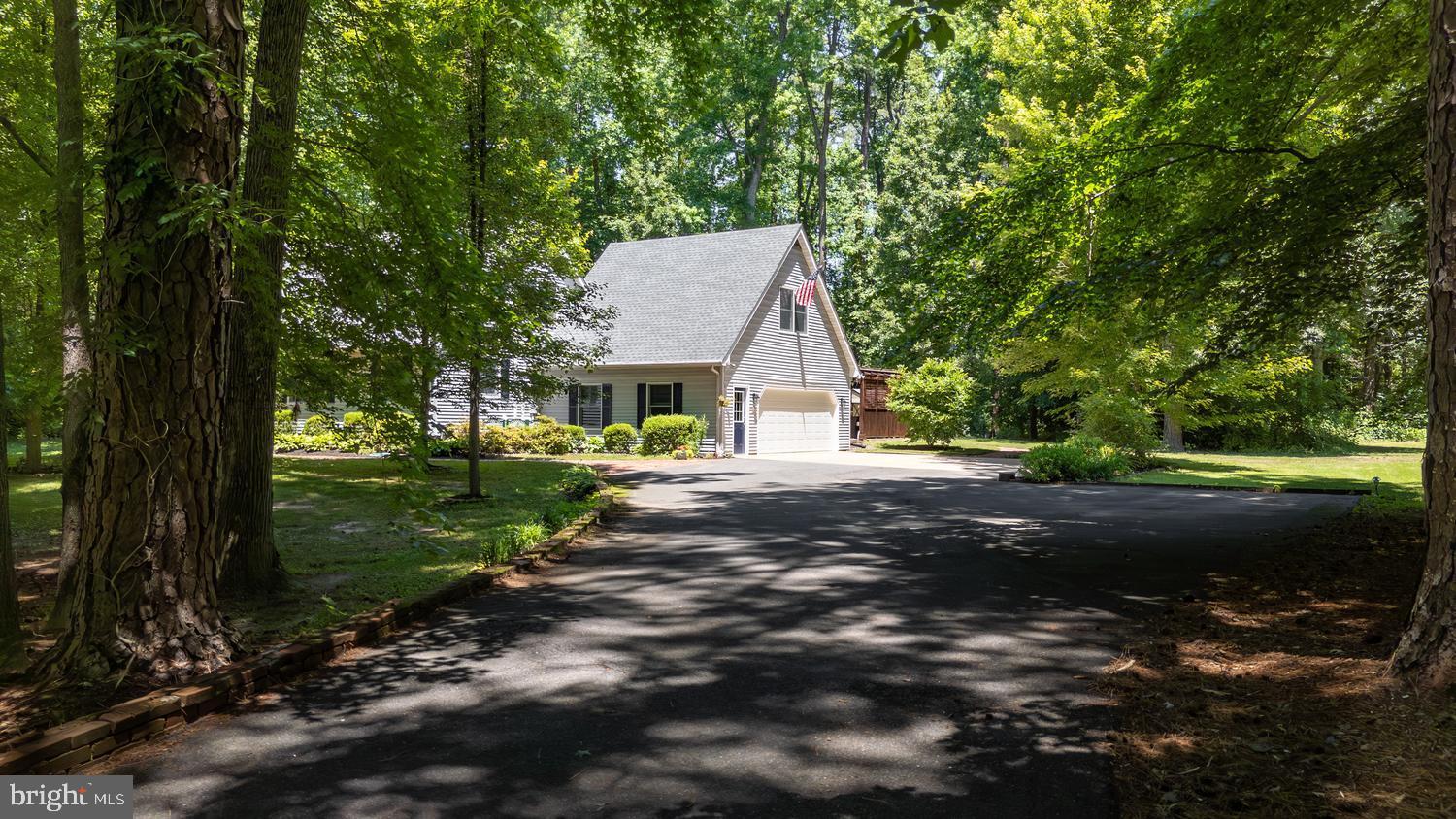 814 Wrights Neck Road Centreville, MD 21617 - Photo 8 of 53 a view of a house with a yard