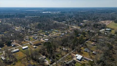 an aerial view of residential house and lake view