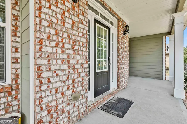 front view of a house with a glass door