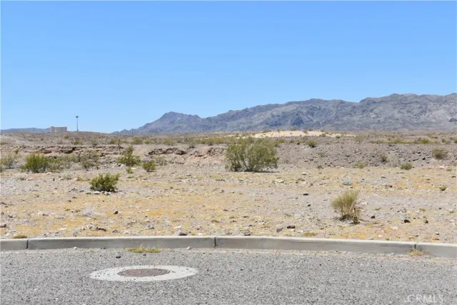 a view of ocean and mountain