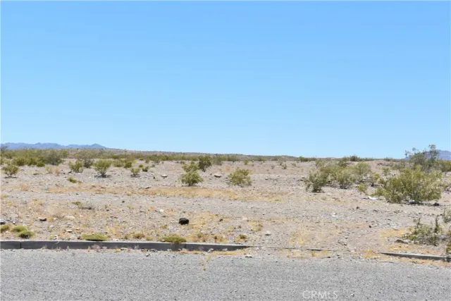 a view of beach and a mountain