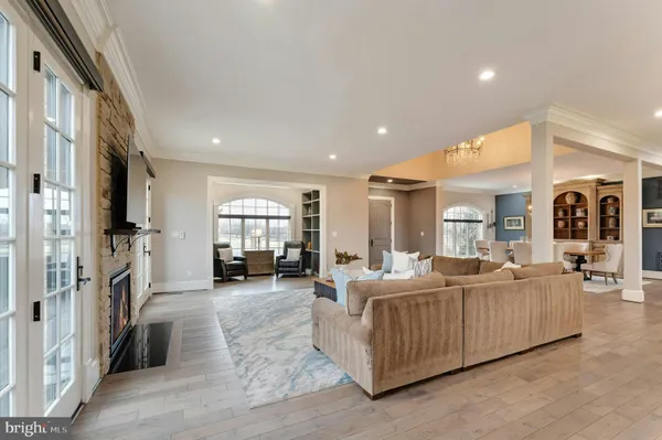 a large kitchen with lots of counter top space and stainless steel appliances