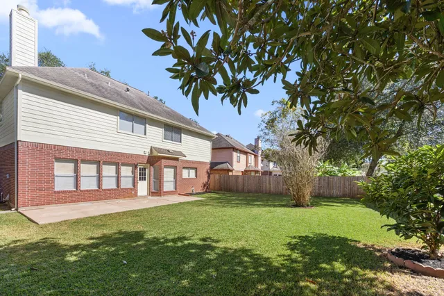 a house view with a garden space