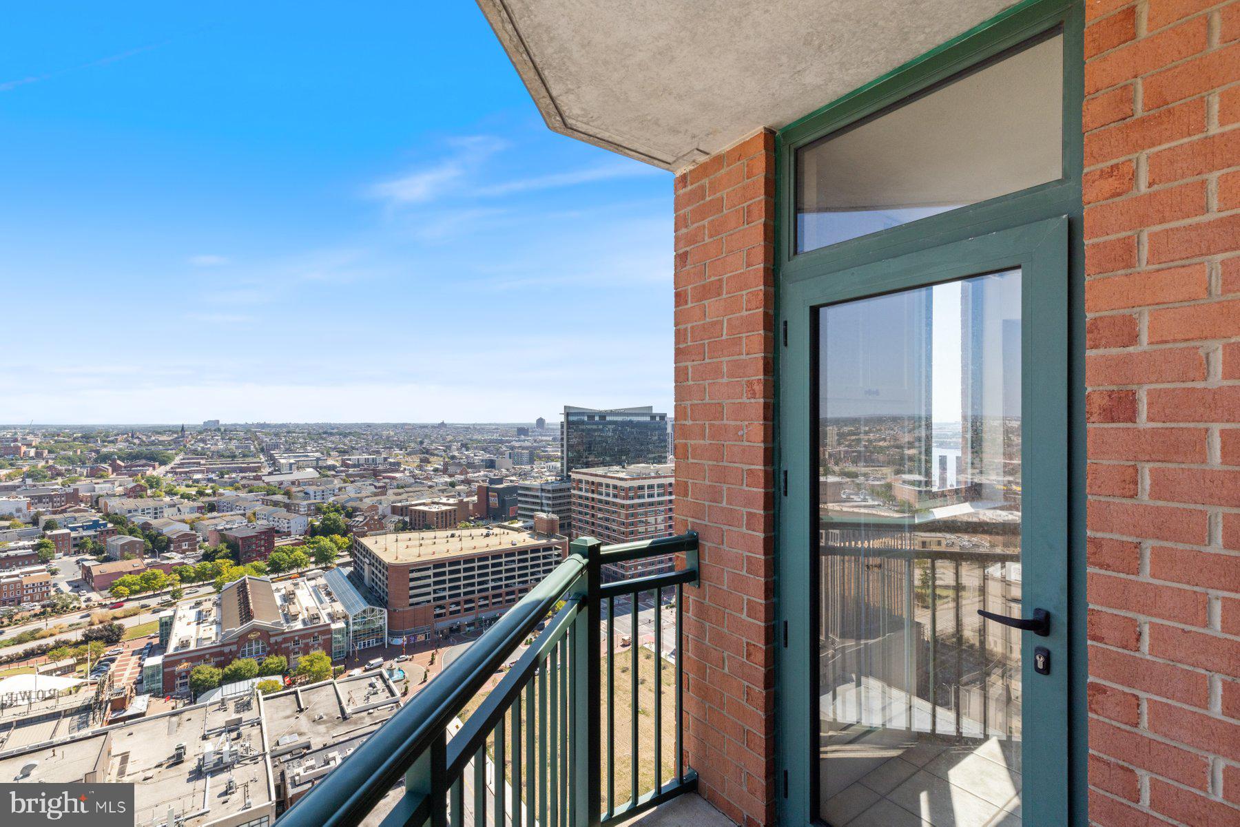 414 Water Street, Unit 2512 Baltimore, MD 21202 - Photo 12 of 40 a city view from a balcony