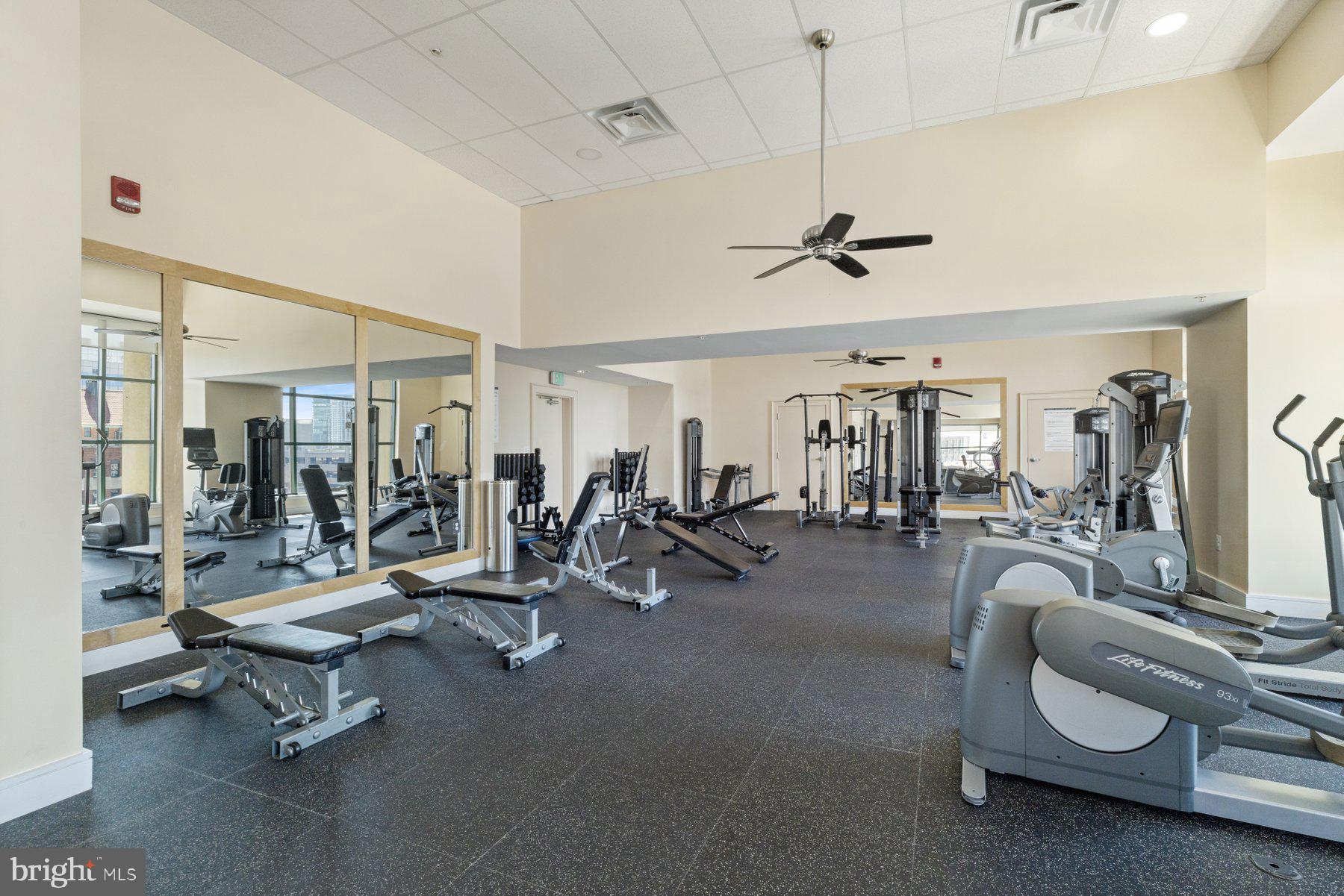 414 Water Street, Unit 2512 Baltimore, MD 21202 - Photo 31 of 40 a view of a room with gym equipment