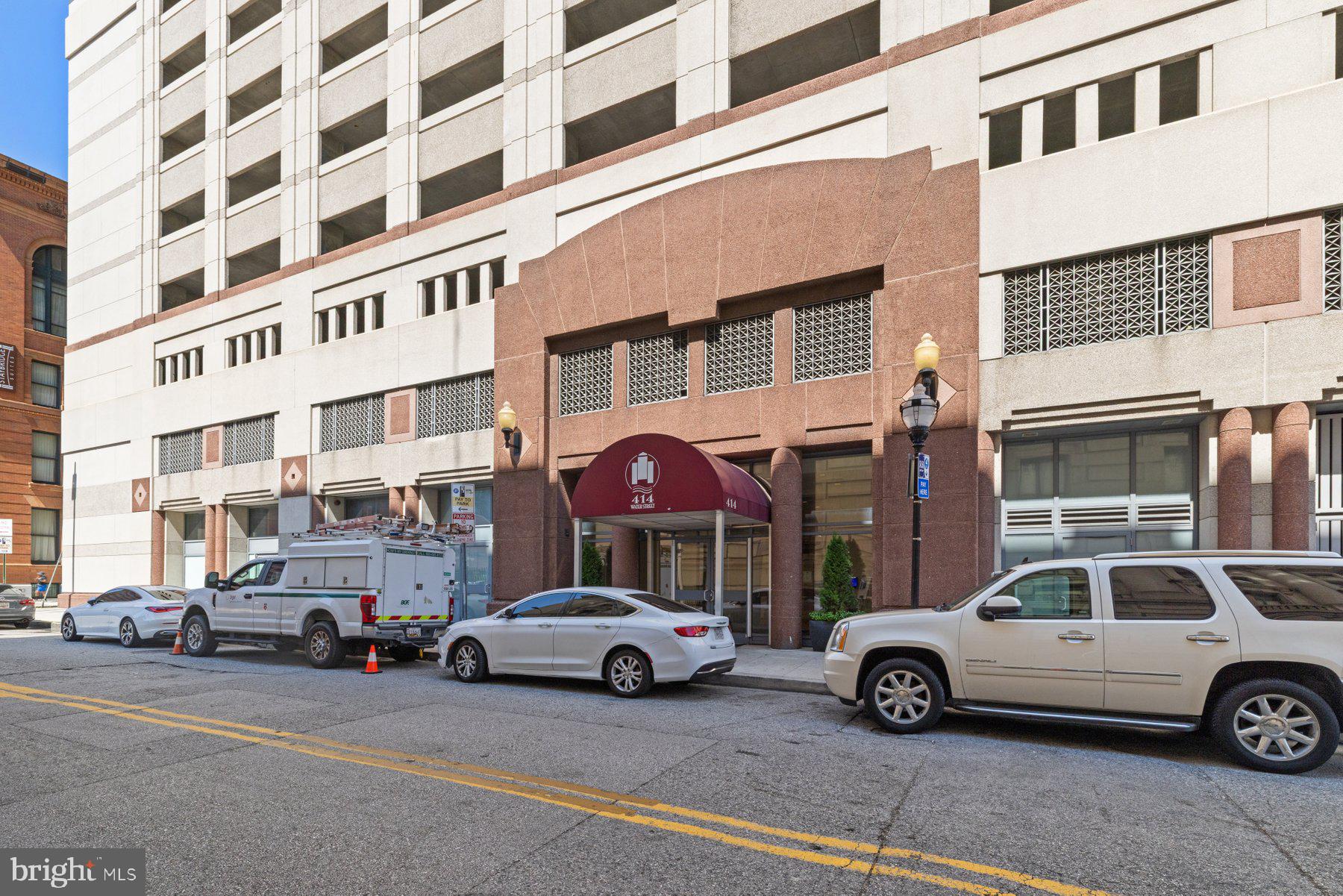 414 Water Street, Unit 2512 Baltimore, MD 21202 - Photo 40 of 40 a car parked in front of a building