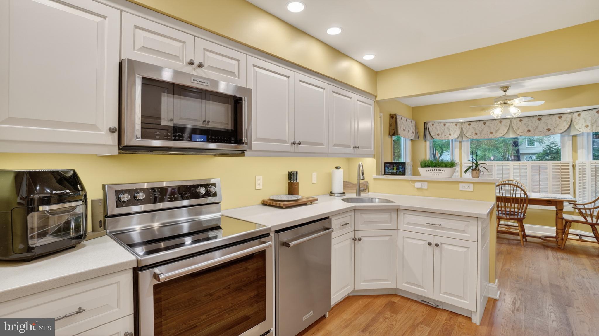 317 Canterfield Road Annapolis, MD 21403 - Photo 15 of 66 a kitchen with a sink stove and cabinets