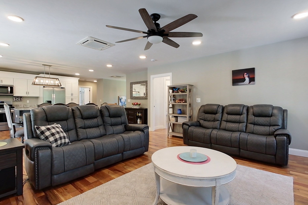 45 Secret Lake Road Phillipston, MA 01331 - Photo 14 of 42 a living room with furniture and a wooden floor