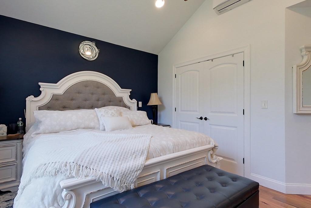 45 Secret Lake Road Phillipston, MA 01331 - Photo 17 of 42 a bedroom with a bed and a table