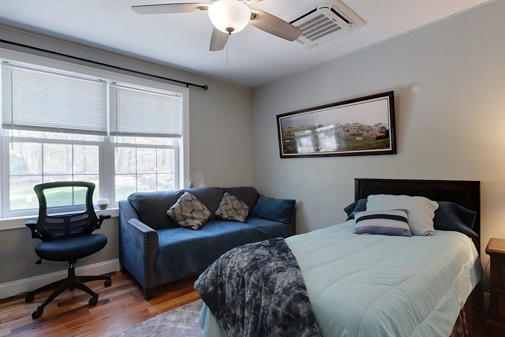 45 Secret Lake Road Phillipston, MA 01331 - Photo 21 of 42 a bedroom with furniture and a window