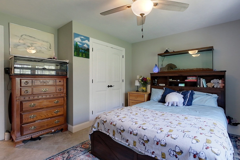 45 Secret Lake Road Phillipston, MA 01331 - Photo 25 of 42 a bedroom with a bed and a dresser