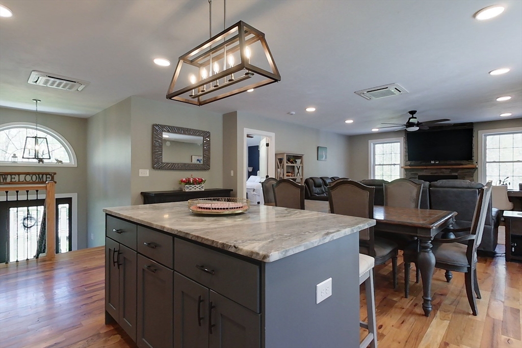 45 Secret Lake Road Phillipston, MA 01331 - Photo 6 of 42 a view of kitchen island dining table and chairs