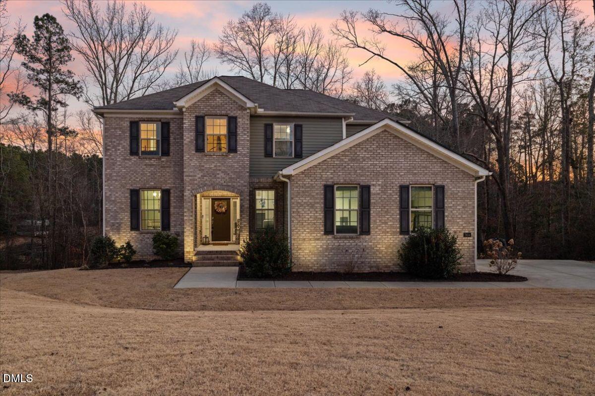 7804 Charters End Street Willow Spring, NC 27592 - Photo 2 of 43 a front view of a house with a yard