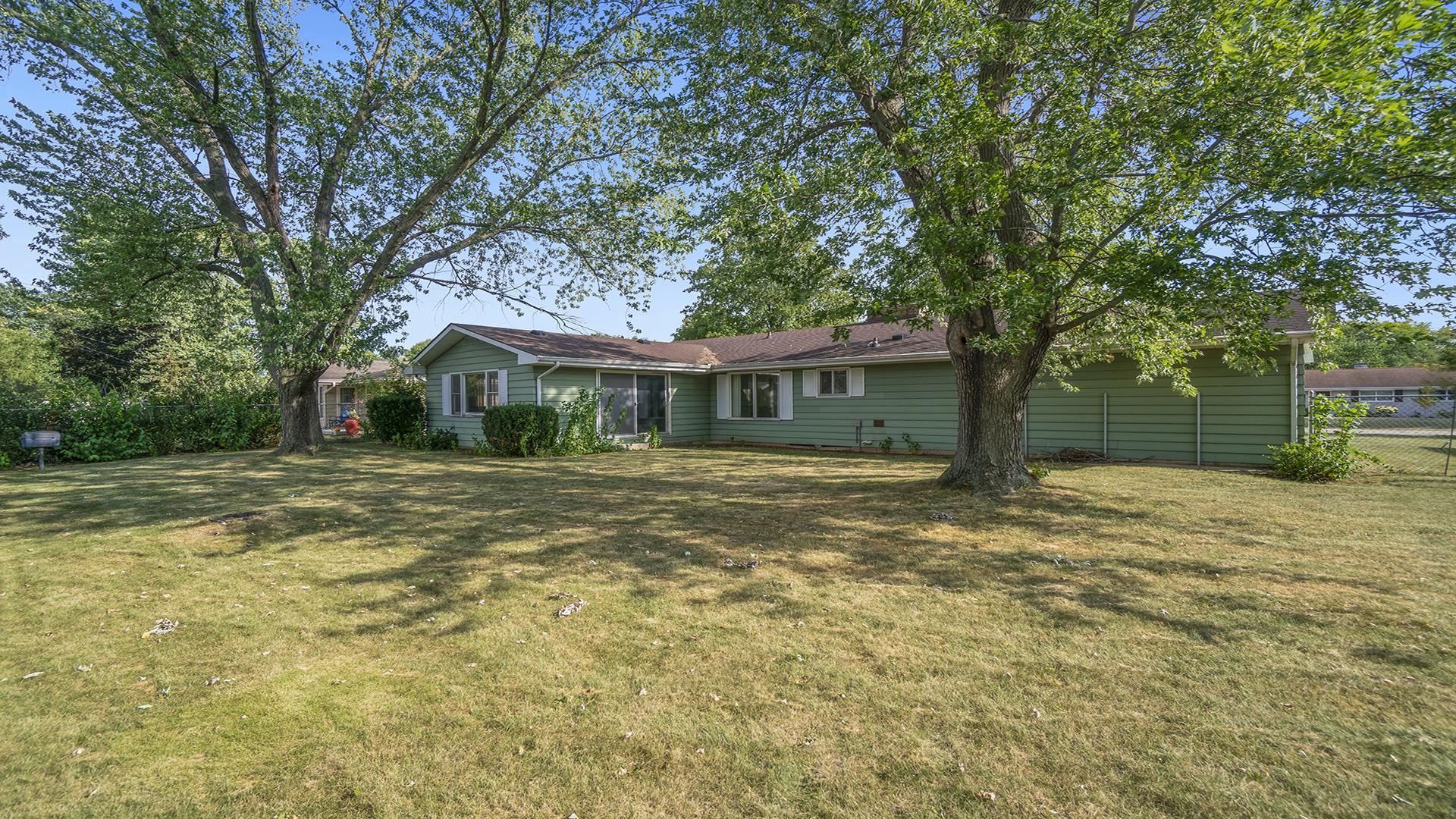 823 East Lilac Road Beloit, WI 53511 - Photo 27 of 28 a front view of house with yard and green space