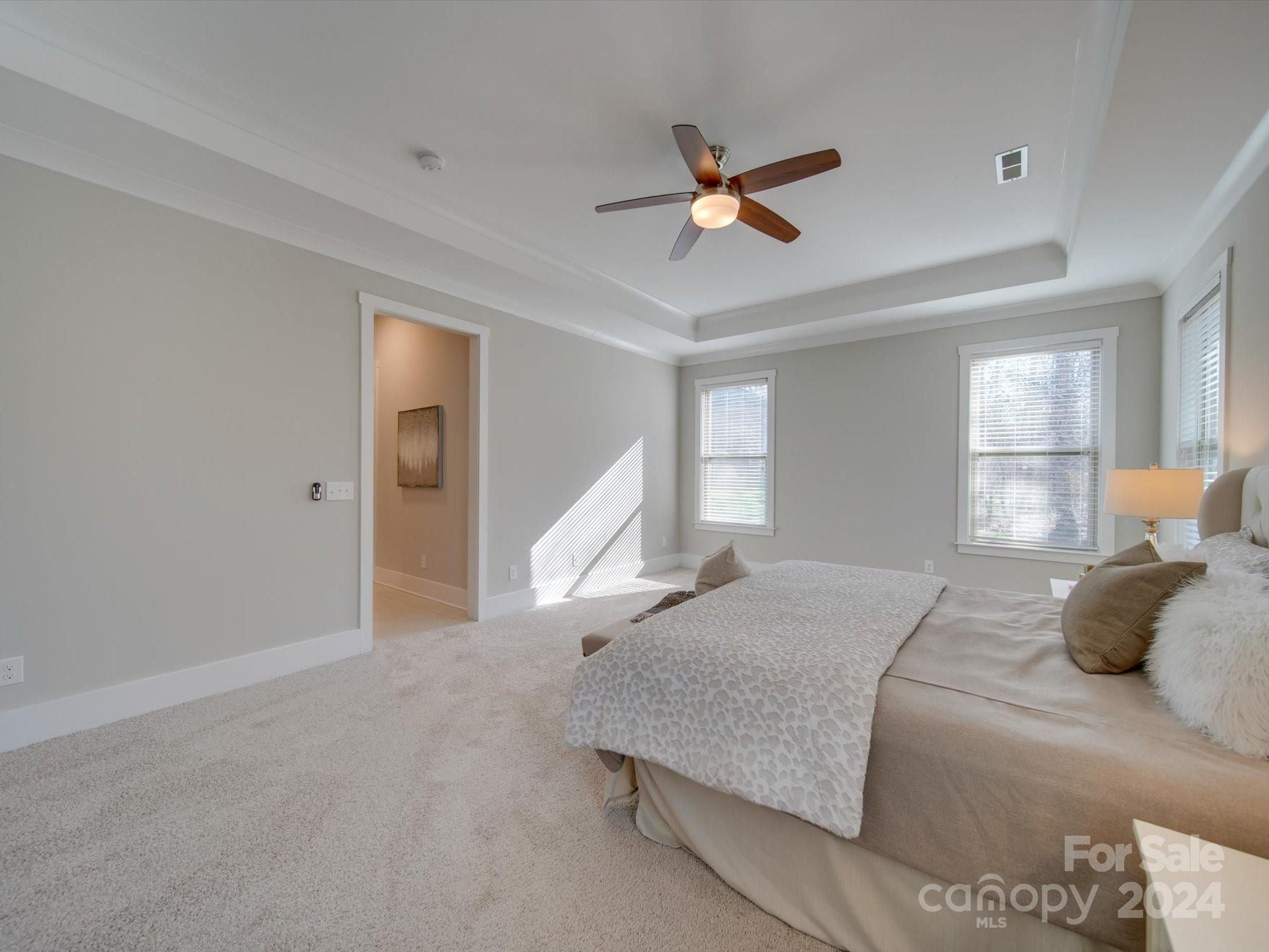 6723 Eliah Drive Weddington, NC 28104 - Photo 25 of 48 a bedroom with a bed and window