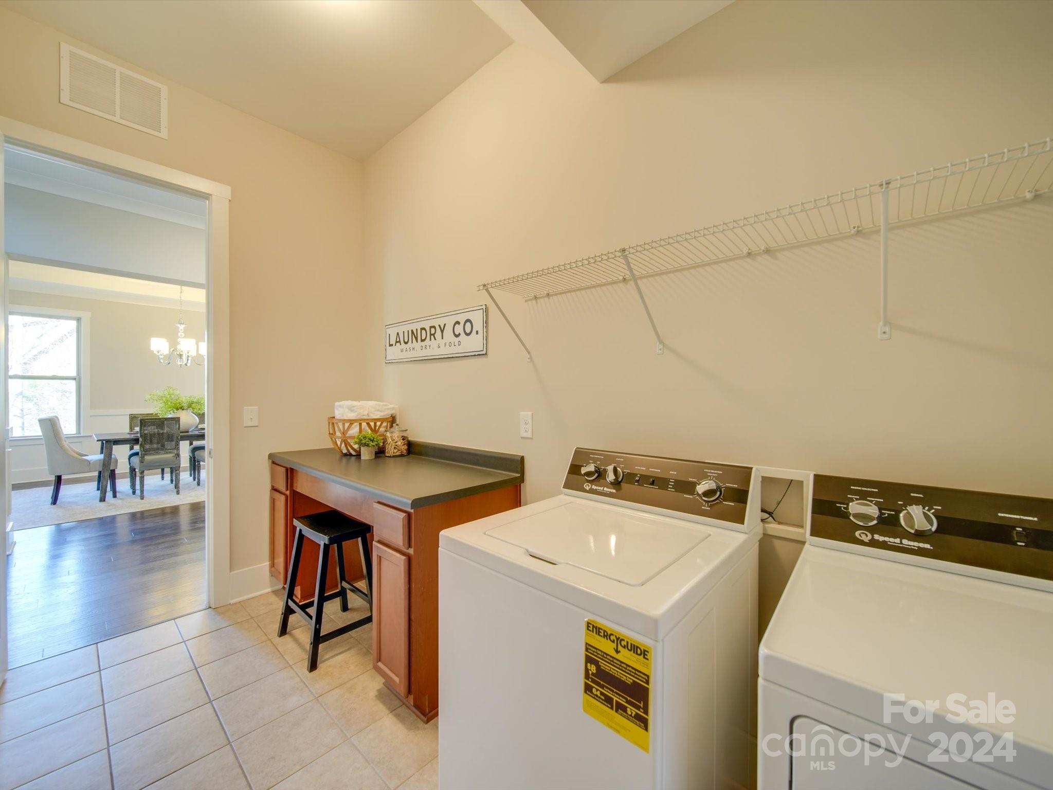 6723 Eliah Drive Weddington, NC 28104 - Photo 27 of 48 a utility room with dryer and washer