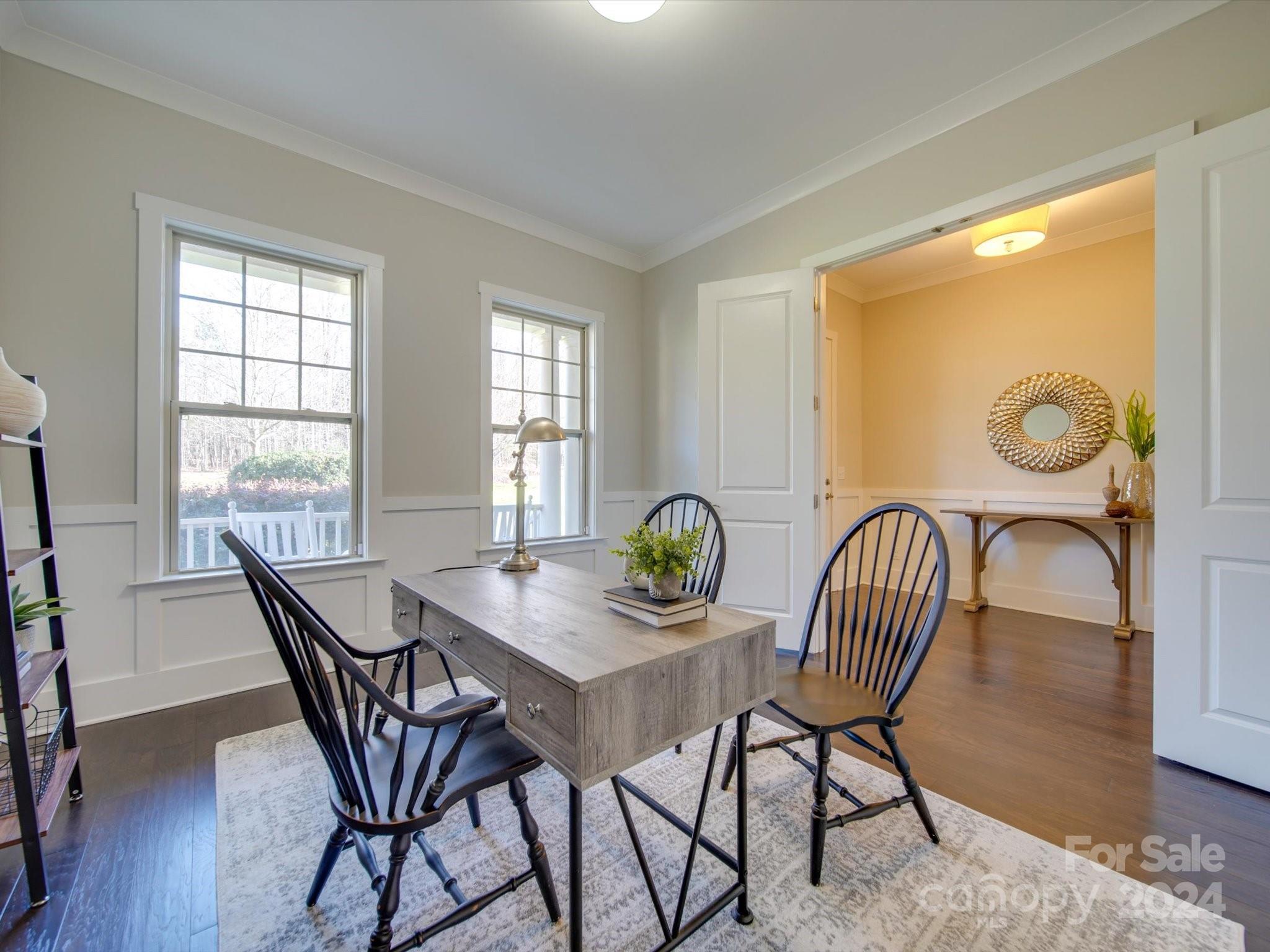 6723 Eliah Drive Weddington, NC 28104 - Photo 6 of 48 a view of a dining room with furniture window and wooden floor