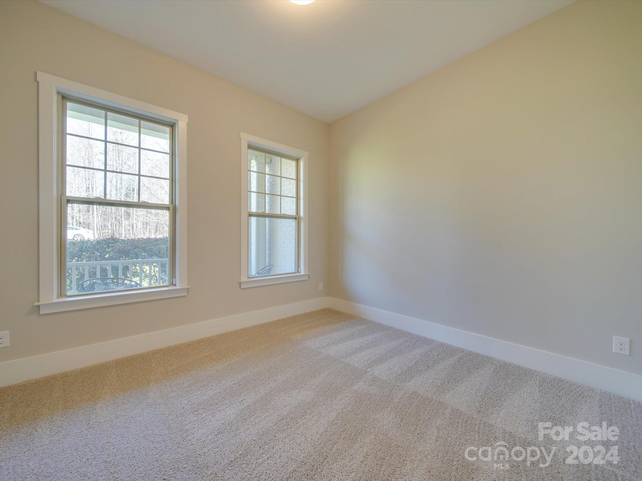 6723 Eliah Drive Weddington, NC 28104 - Photo 8 of 48 an empty room with a window