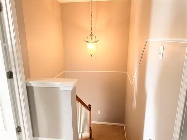 a bathroom with a shower and a sink