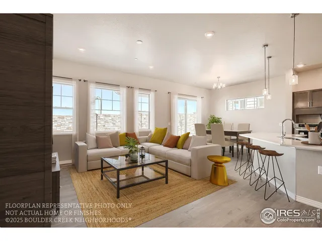 a living room with furniture a dining table and a flat screen tv