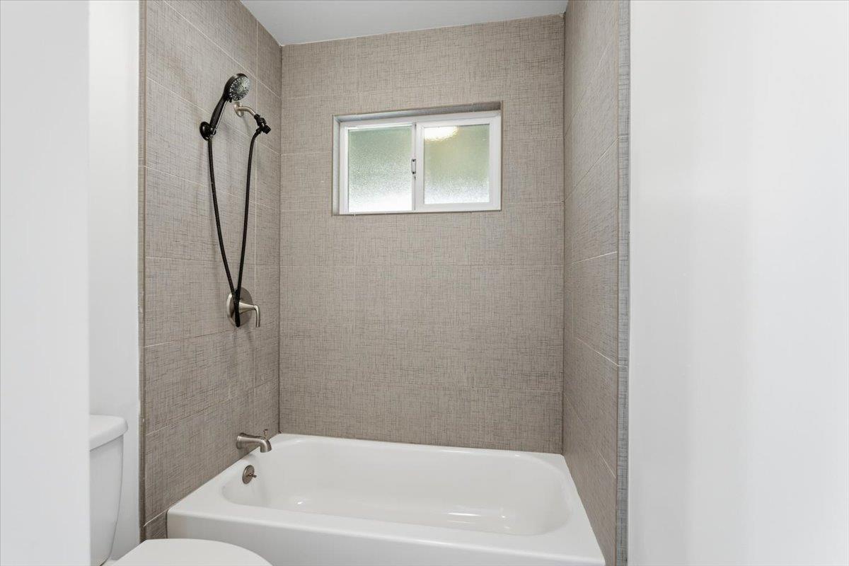 209 Tokay Avenue Modesto, CA 95350 - Photo 19 of 30 a bathroom with a bathtub