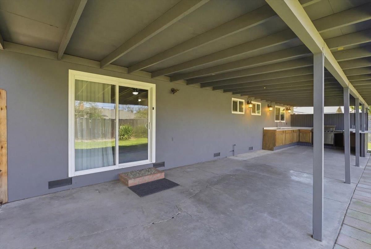 209 Tokay Avenue Modesto, CA 95350 - Photo 20 of 30 a view of an empty room with a window