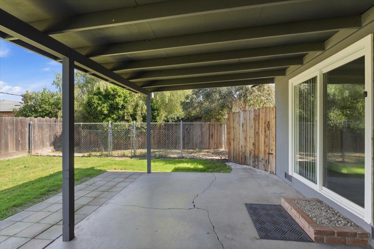 209 Tokay Avenue Modesto, CA 95350 - Photo 24 of 30 a view of swimming pool with garden