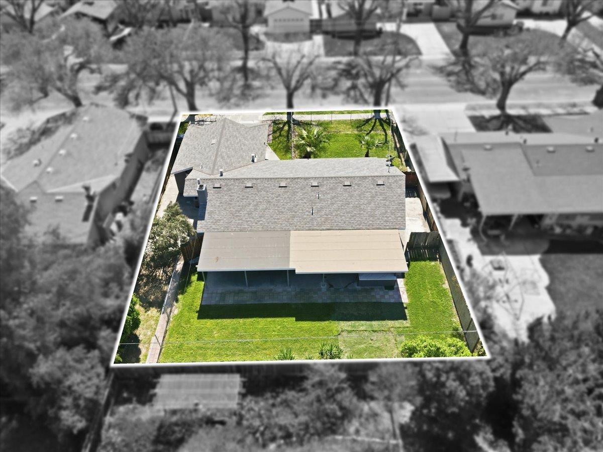 209 Tokay Avenue Modesto, CA 95350 - Photo 27 of 30 a view of swimming pool with a yard