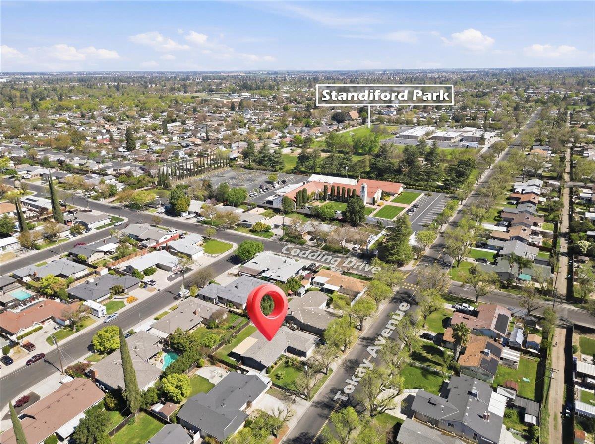 209 Tokay Avenue Modesto, CA 95350 - Photo 29 of 30 an aerial view of residential building and parking space