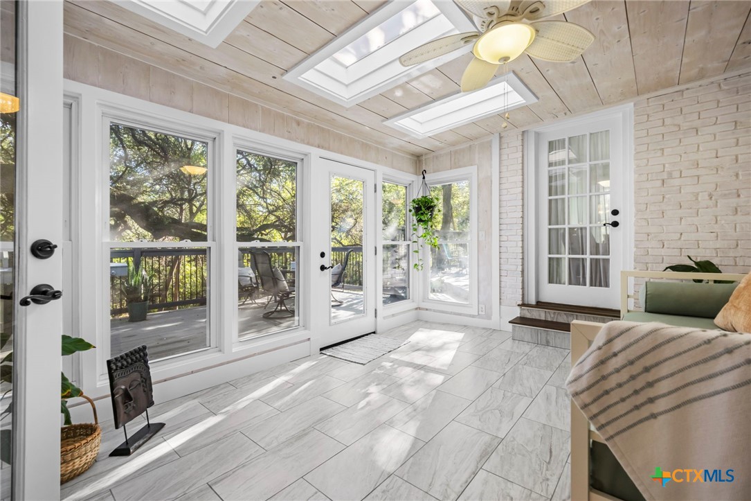 2509 Forest Trail Temple, TX 76502 - Photo 16 of 42 a bedroom with furniture and large windows